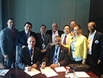 Leaders from AUA and AUCA sign a MOU for collaborations.